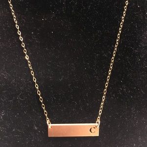 Necklace gold costume jewelry.